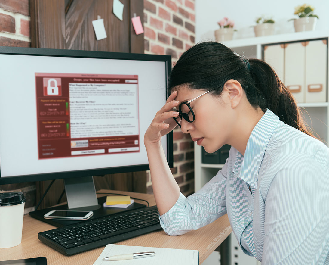 teaser woman worried in front of computer