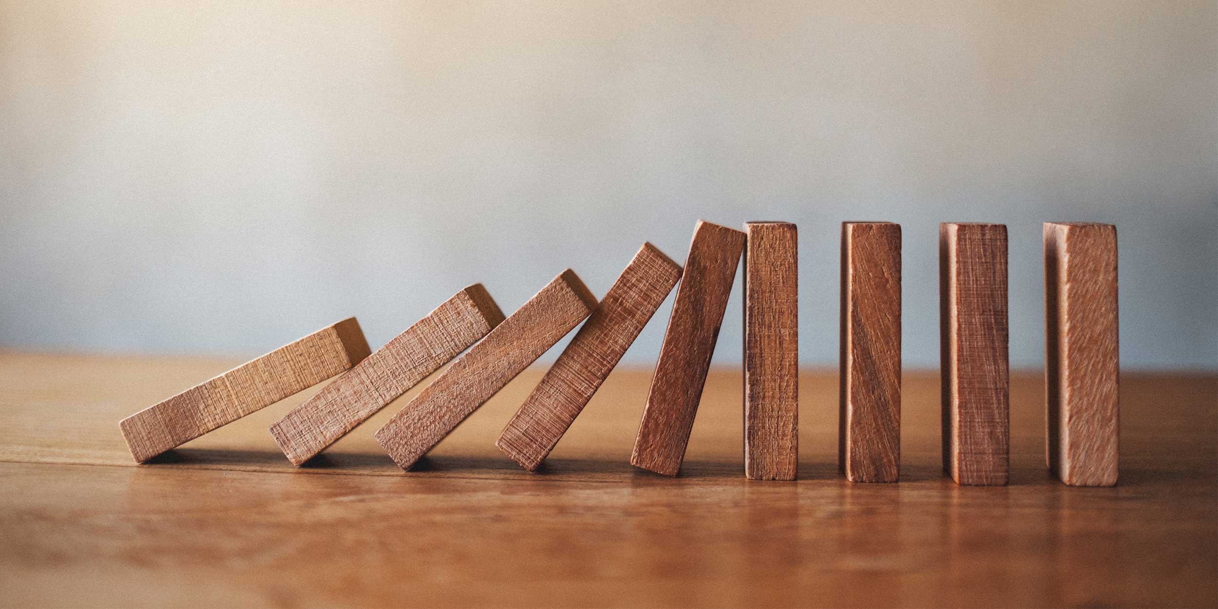 falling wooden dominoes blocks