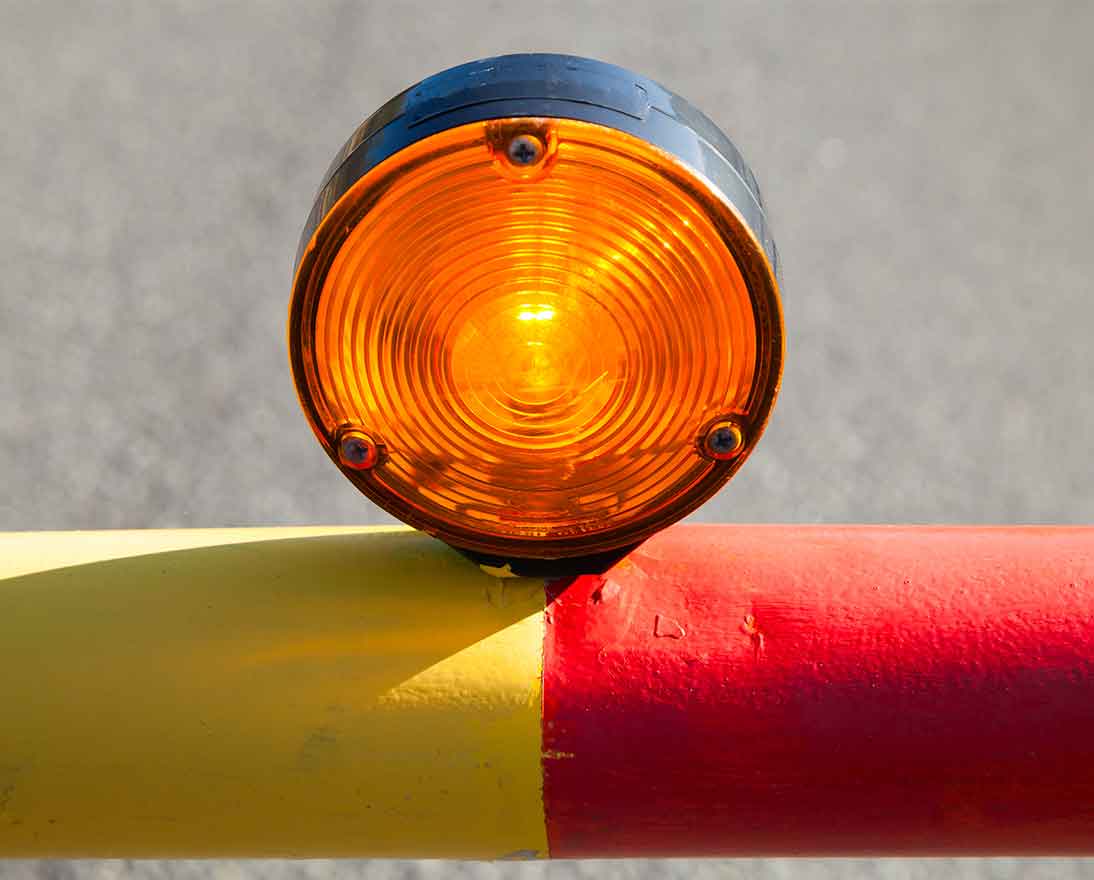 Red light on the automatic road barrier