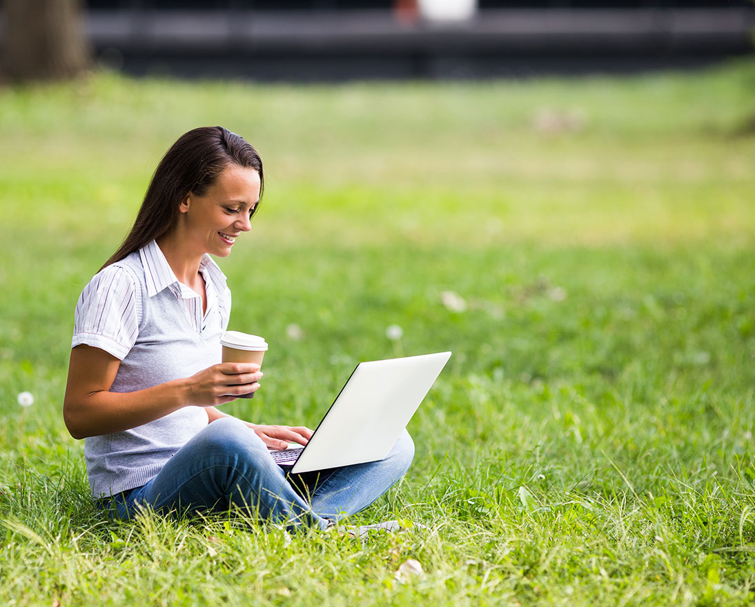 woman on laptop outside