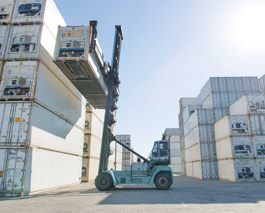 A lift truck carrying a container