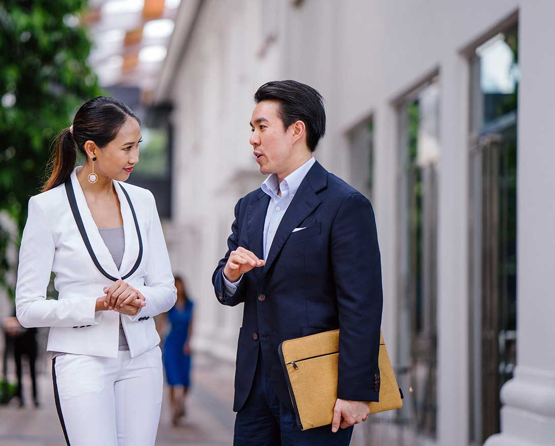 two business people talking